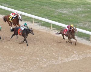 Far Right and Mike Smith winning the Smarty Jones. Coady Photography